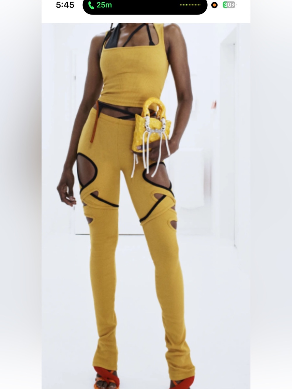 Ottolinger Mustard Cutout Knit Leggings with Black Trim and matching tank top
